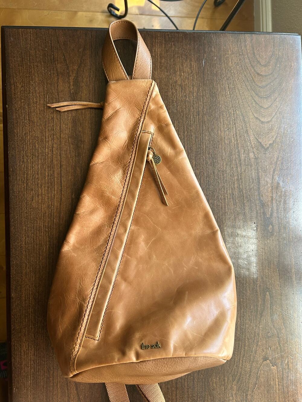 The Sak Geo sling backpack purse bag Brown